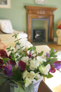 Flowers in Drawing Room with fire place