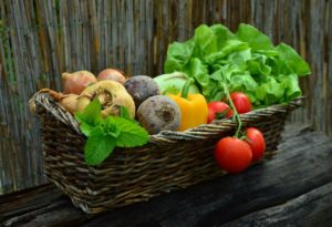 A basket of bright fresh vegetables