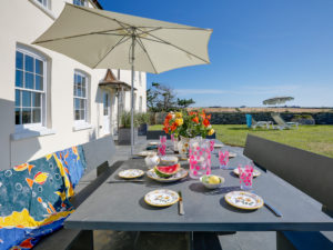 A large outdoor dining area with parasol